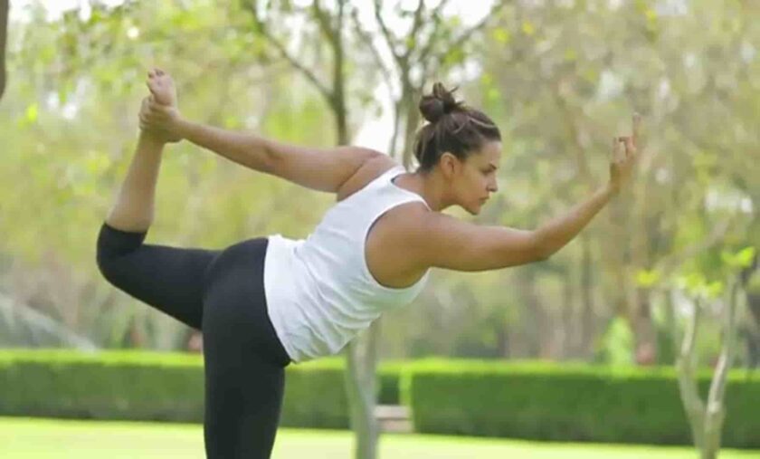 Neha Dhupia doing yoga during her Pregnancy